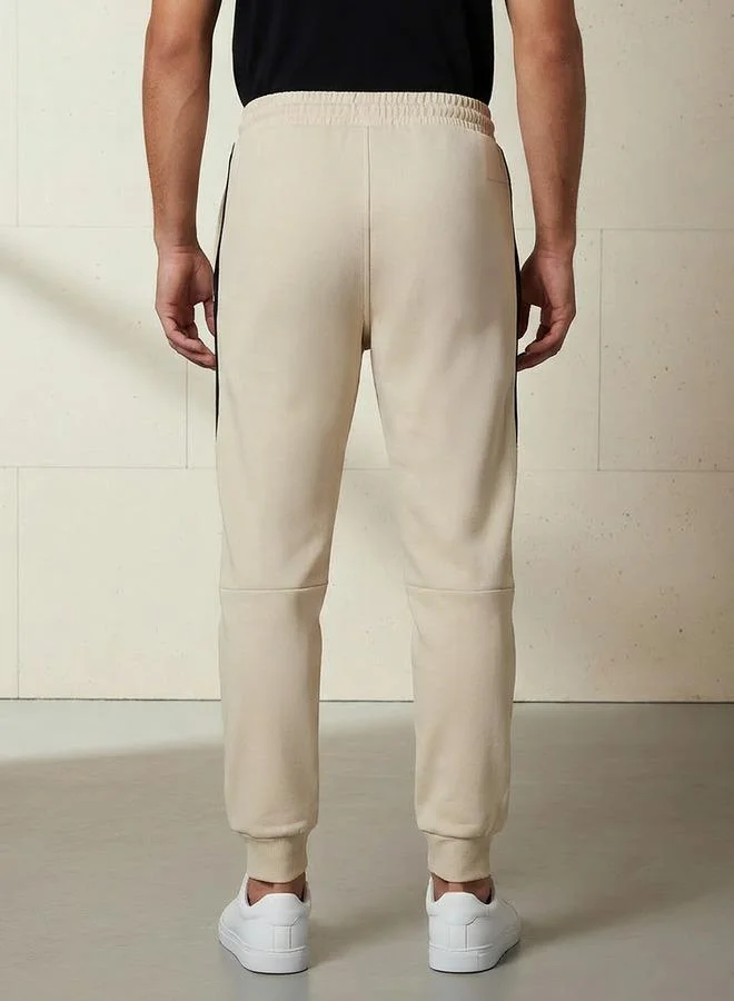 Kappa  Kappa Men Jogger with Heat Sealed Zip Pockets for Men | Best Price UAE